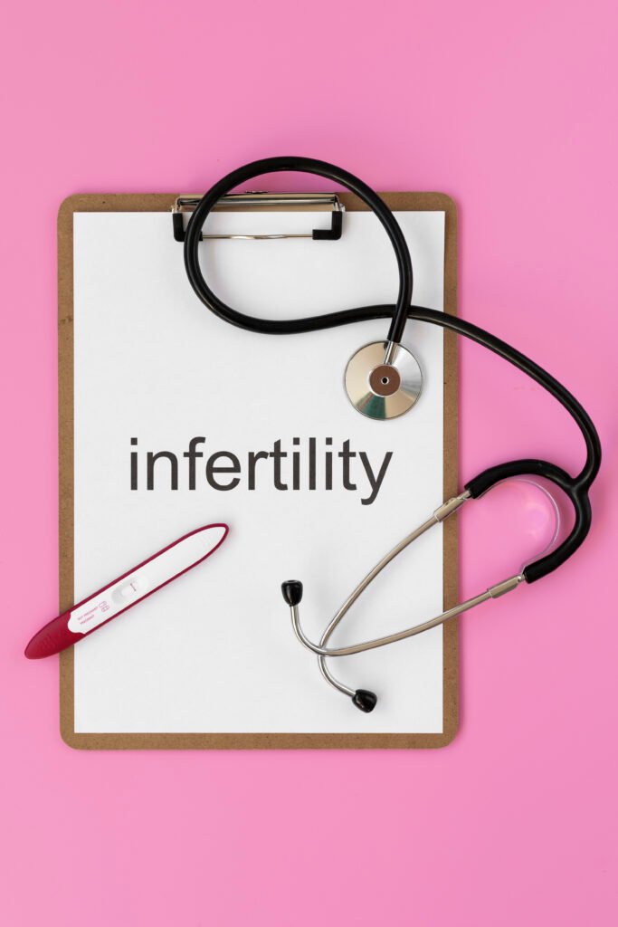 top-view-infertility-word-written-paper